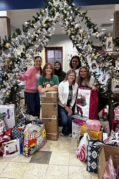 Christmas gift drive, ladies smiling