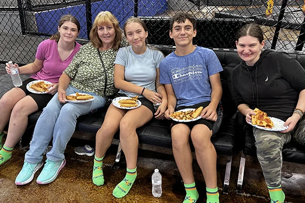 Back to School Bash Party - seated family smiling