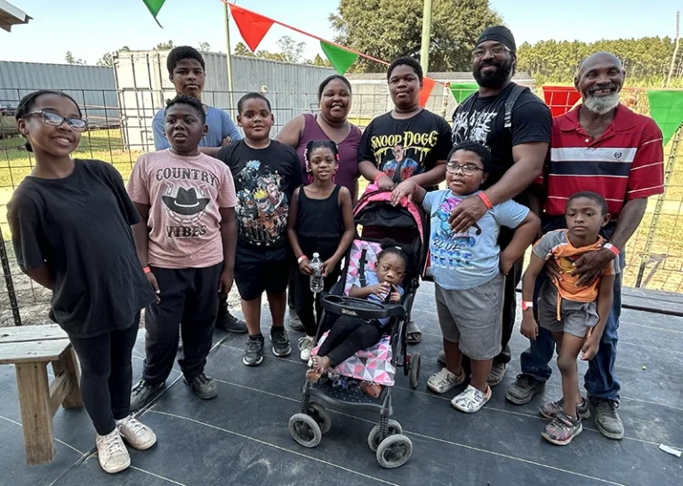 group of parents and kids smiling